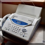 E25. Brother fax.